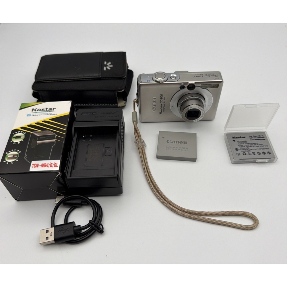 Canon PowerShot SD600 Digital ELPH 6.0MP Digital Camera 2 Batteries Charger Case